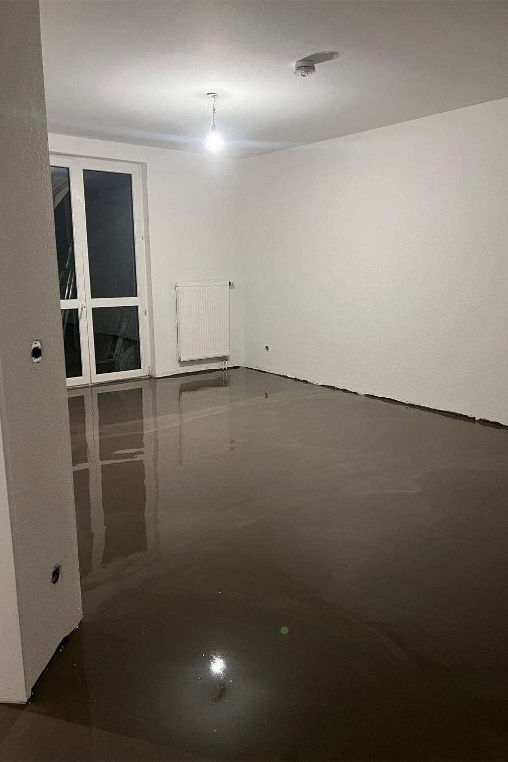 Bodenlegerarbeiten-Ausgleichmasse